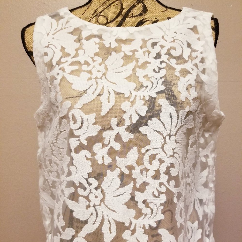 Shear embroidered sleeveless shell top
